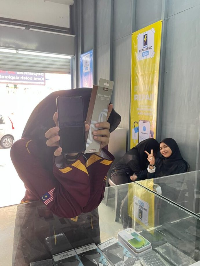 repair phone nilai